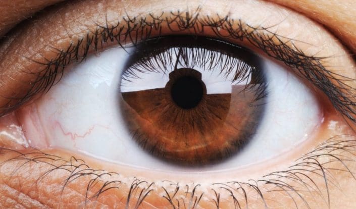 Close-up image of a human eye looking at the camera