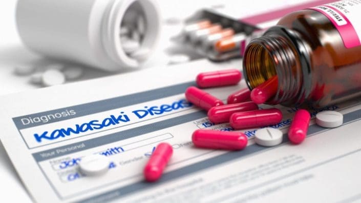 Diagnosis sheet for Kawasaki disease and several bottles of open medicine