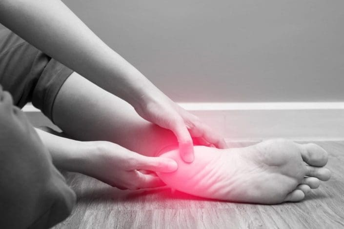 sharp pain on bottom of foot near heel
