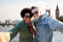 couple taking selfie with London background