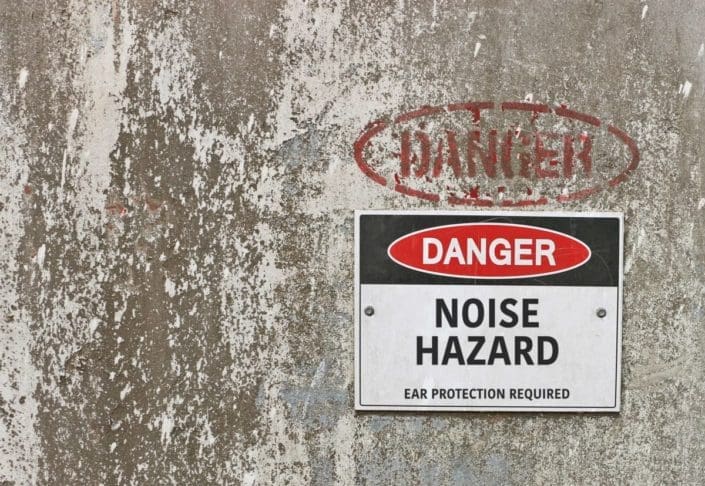 A picture of a sign that reads, “Danger: Noise Hazard.”