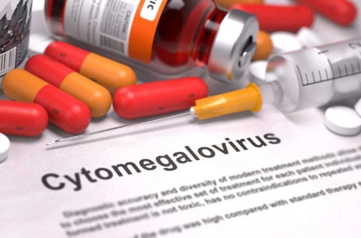 Cytomegalovirus - Printed Diagnosis with Red Pills, Injections and Syringe