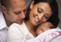 Happy Parents with Newborn Baby