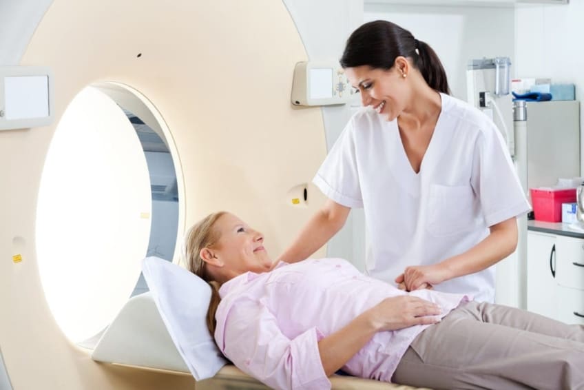 Woman undergoing CT scan