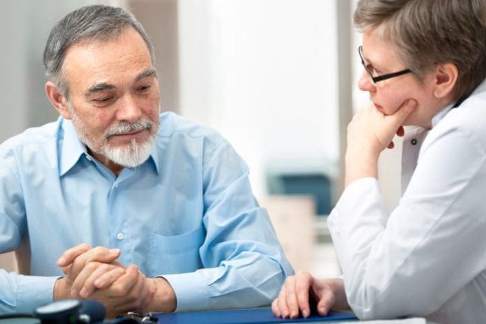 Doctor talking to patient