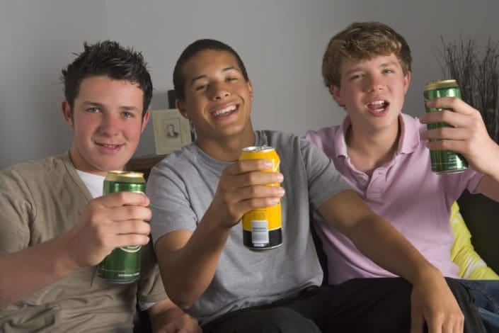 Teen boys drinking