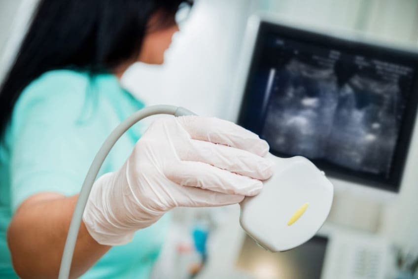 Technician doing ultrasound