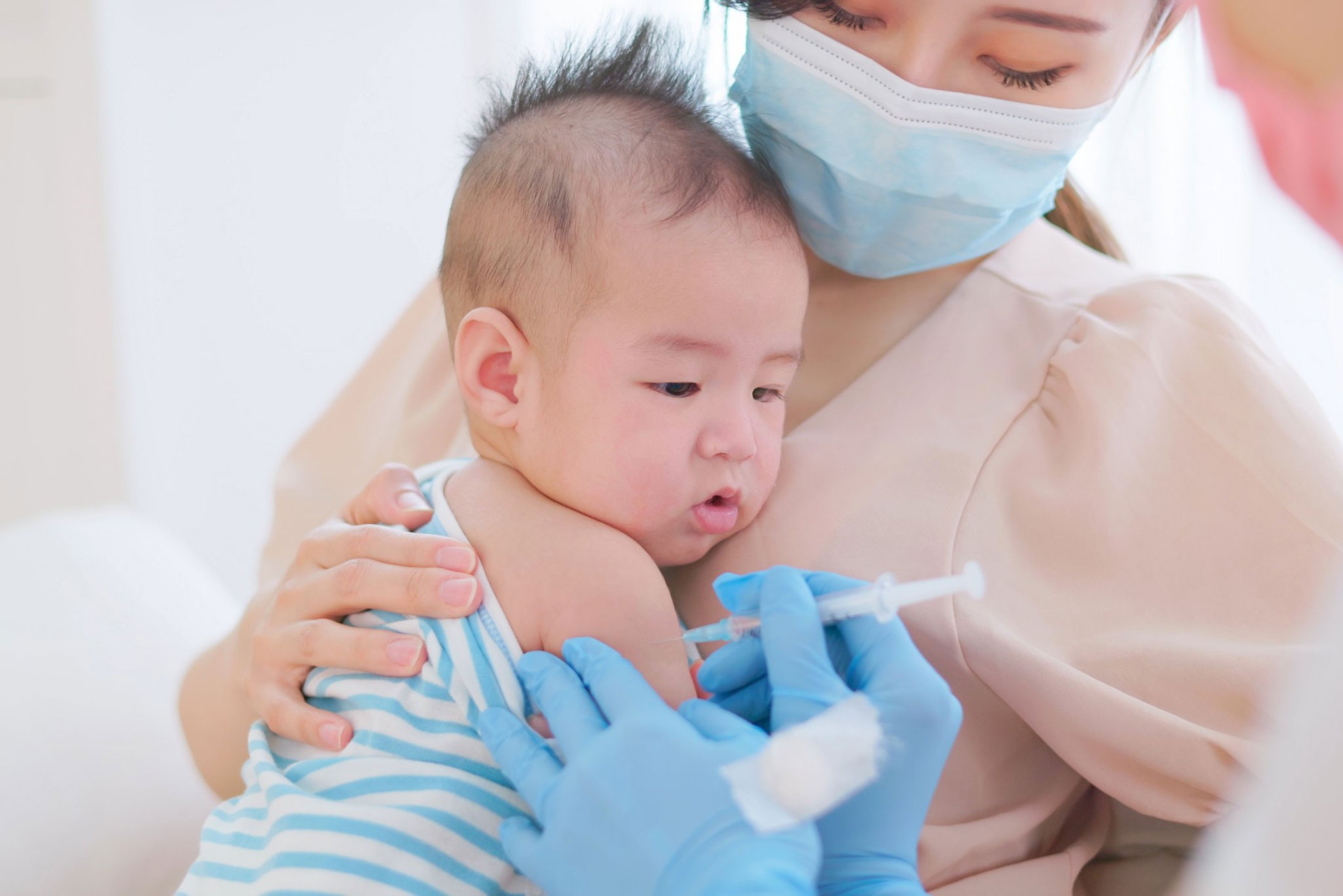 Baby receives vaccine