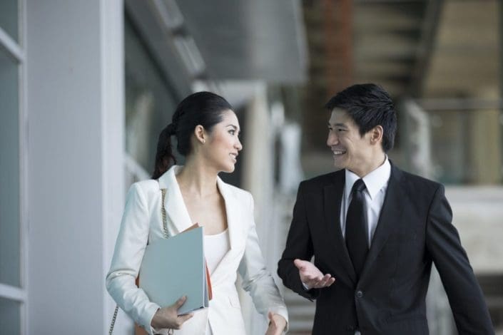 Business colleagues walking together