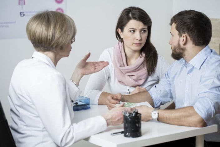 couple talking to a doctor