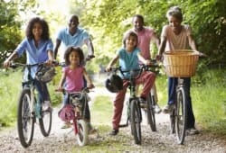 multigenerational family riding their bikes