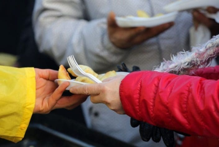 local community social services handing out food to those in need
