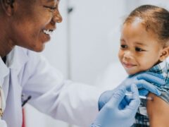 A doctor gives a child a vaccine in the arm. There are many misconceptions regarding vaccines. Use this evidence-based information to avoid common vaccine myths.