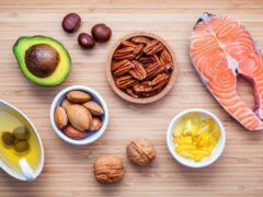 Assortment of foods high in omega-3s and unsaturated fats. Fat should be part of your diet. Your body uses for good fats energy and other health benefits, but bad fats lead to serious health problems.