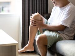 Asian middle aged man suffer from Arthritis,Patellar Tendinitis,symptom of Gout,deposition of chalkstones,painful inflammation and stiffness of the joints,ligament injuries,feel tingling pain in knee