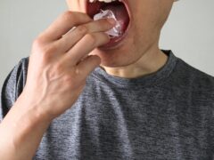 Close-up of a person eating ice